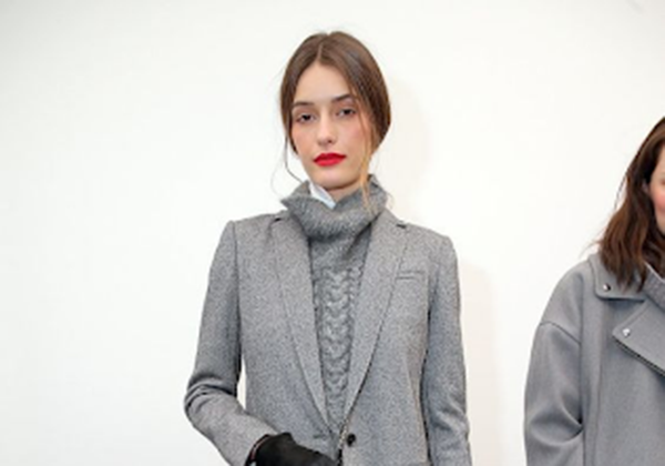 Classy Female Model with Grey Coat and Jeans